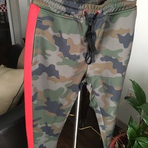 Camo and red joggers.